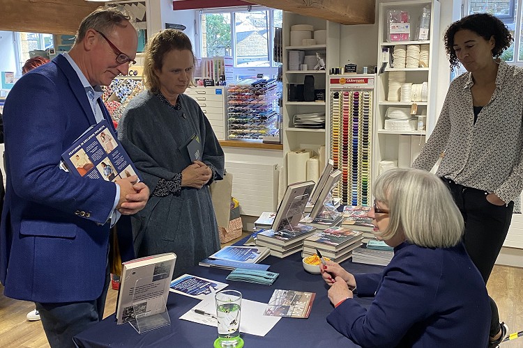 William Gaunt having his book signed by Esme